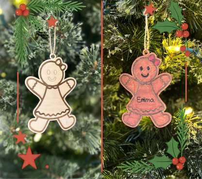 Two gingerbread girl ornaments on a Christmas tree with decorative elements.