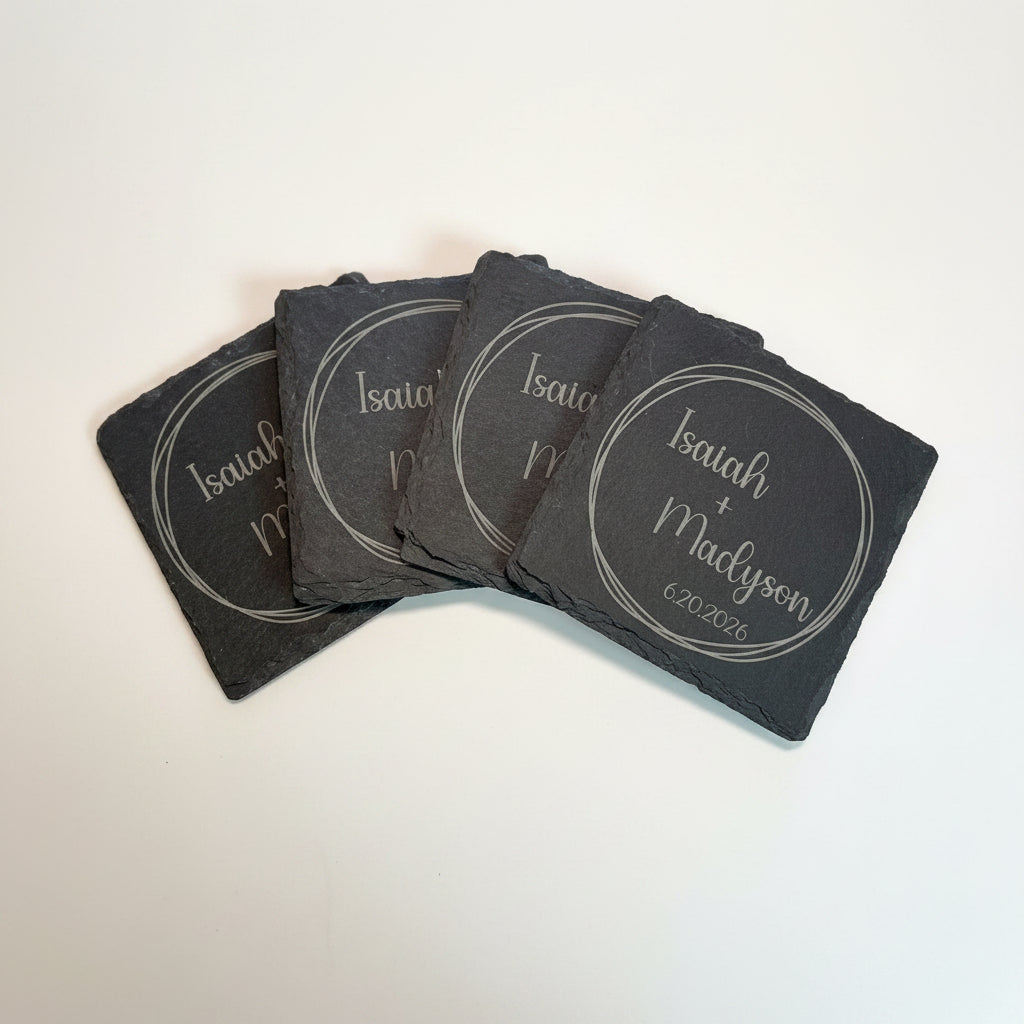 Two engraved walnut keychains in a personalized wedding gift box for the couple