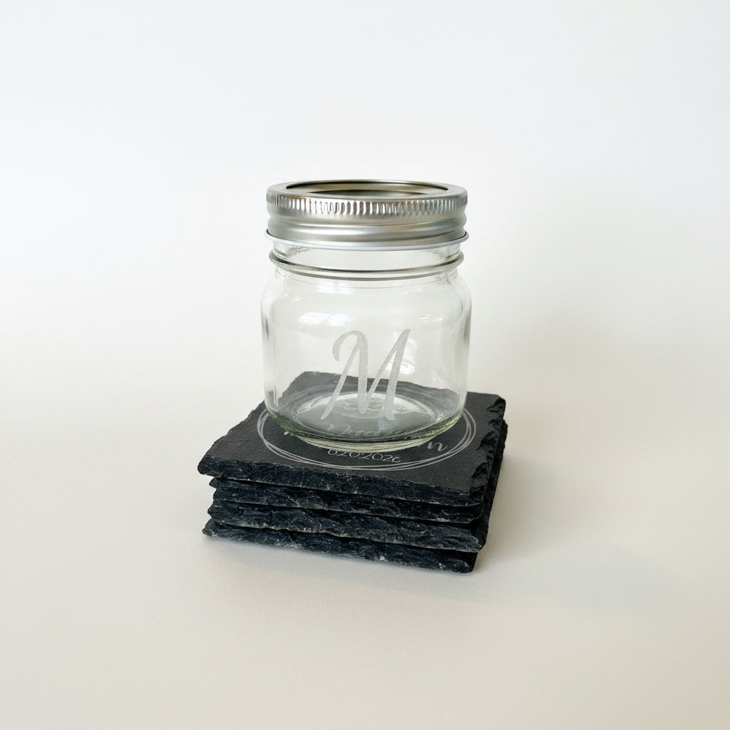 Laser-engraved glass jar inside a personalized wedding gift box for newlyweds
